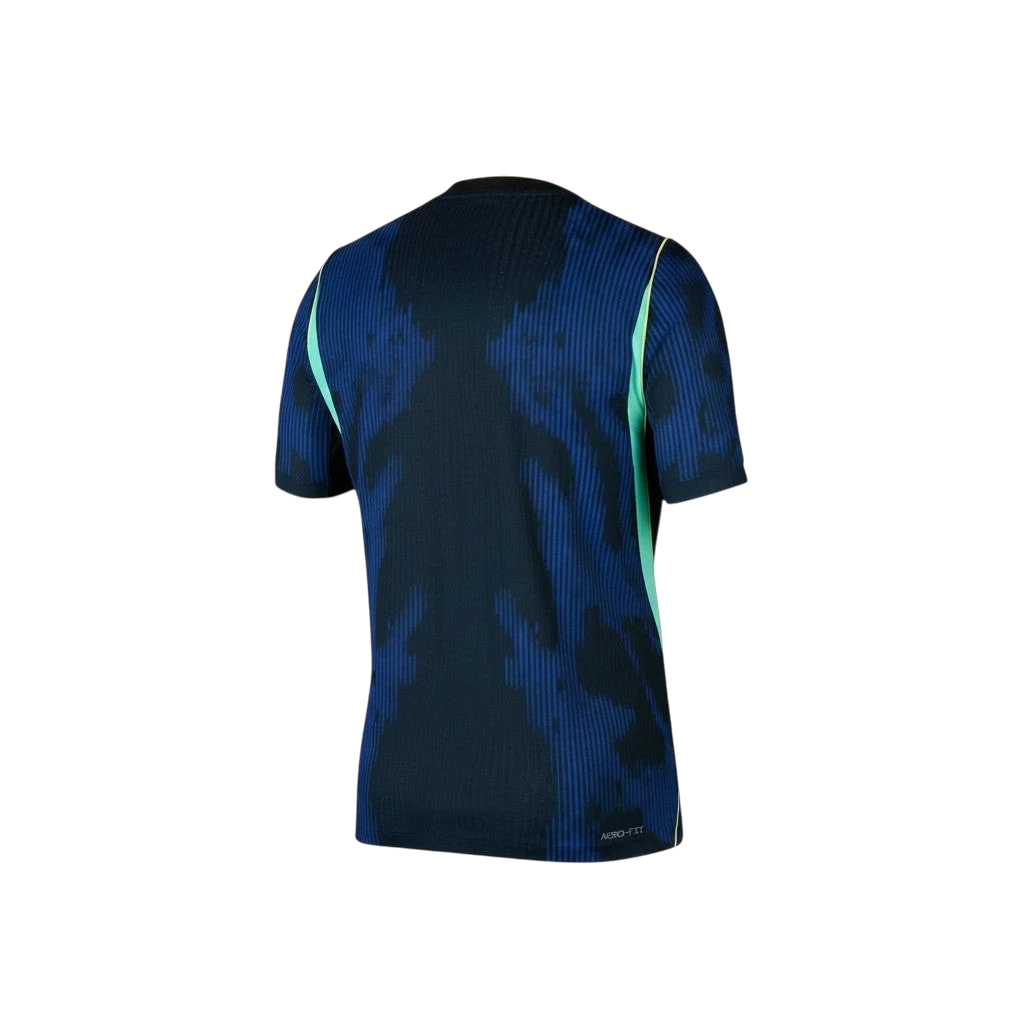 Camiseta de fútbol segunda equipación Brasil azul marino con diseño abstracto y detalles verde menta. Tejido ligero.