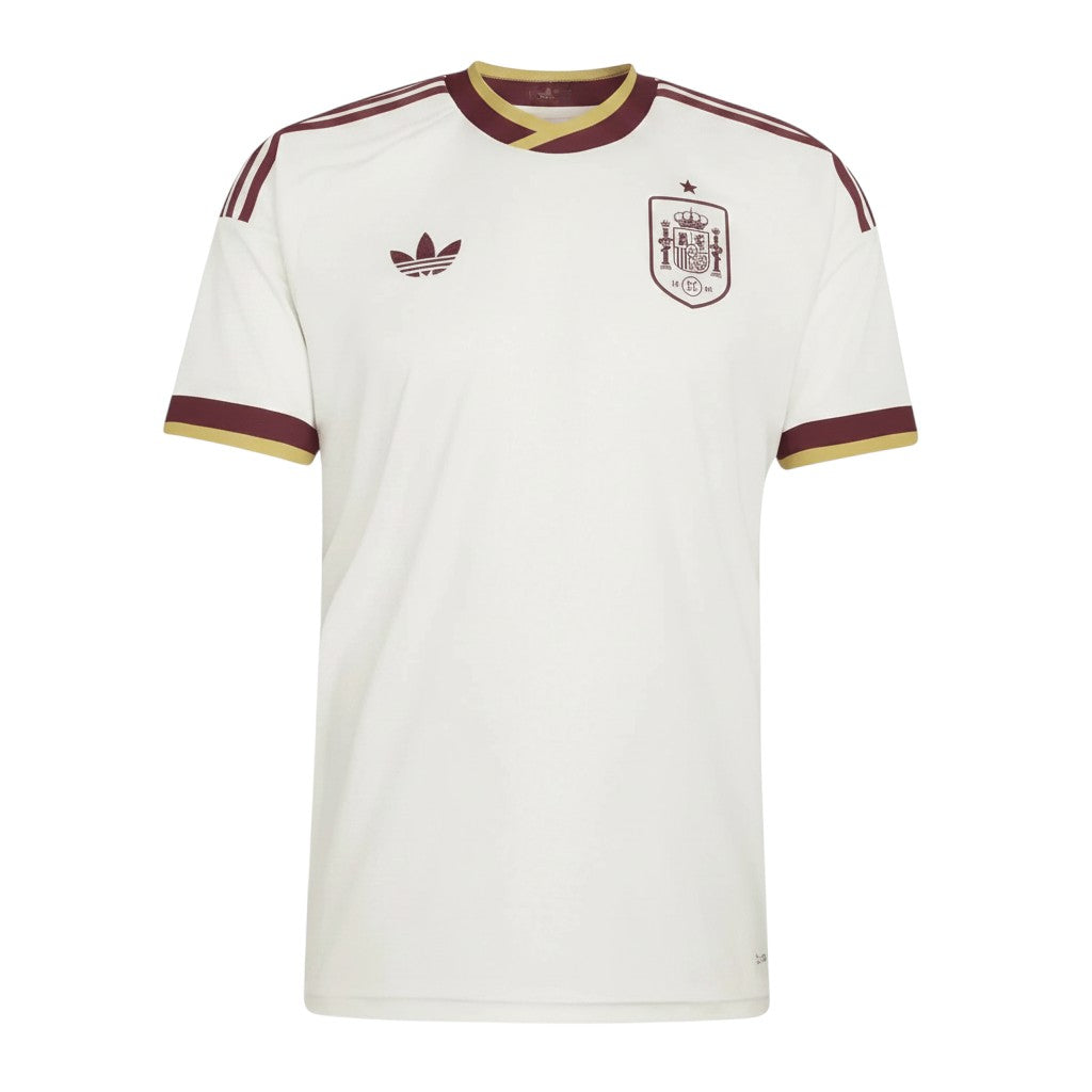 Camiseta de fútbol blanca de España de segunda equipación de CeFutShop con detalles granates y dorados en cuello y mangas.