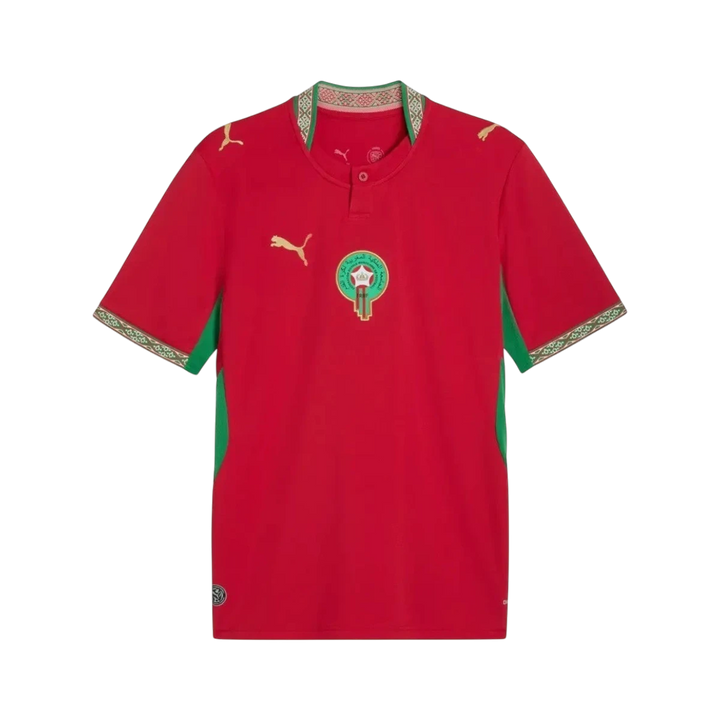 Camiseta de fútbol roja de Marruecos 1ª equipación 2026 de Puma con detalles verdes y escudo del equipo.